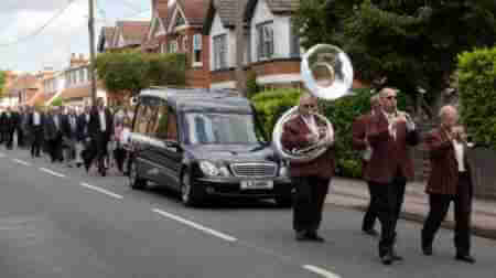 A New Orleans Style Jazz Funeral procession led by this marching band in Hampshire, a band for a funeral